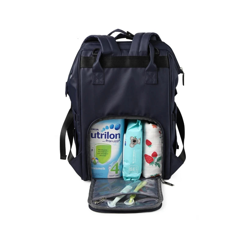 Compartiments intérieurs du sac à langer imperméable avec biberon et couches