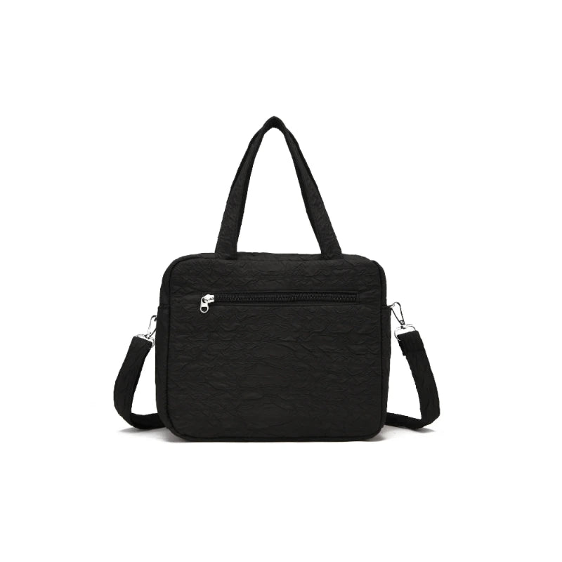 Sac à langer noir vue arrière avec bandoulière ajustable réglable